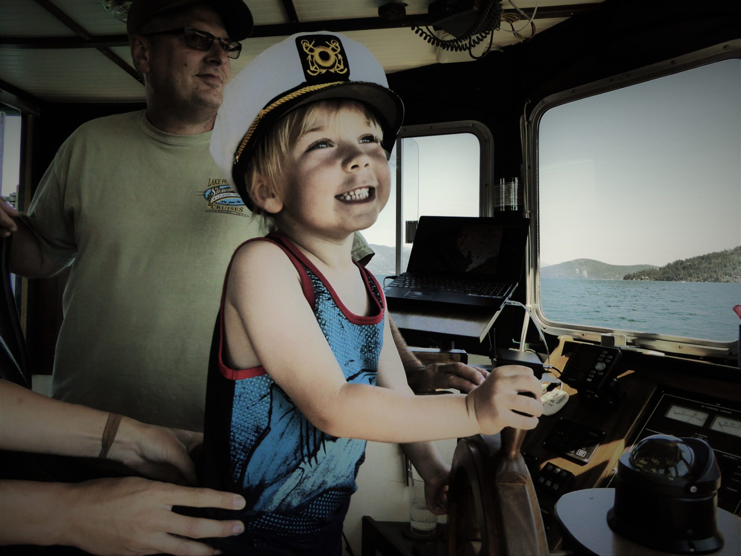 a person standing in front of a laptop